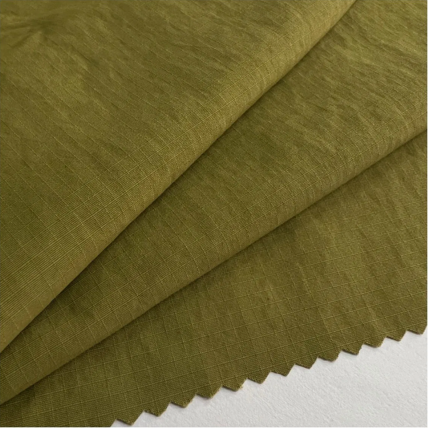 100% Nylon Pearly Coated Winter Jacket Fabric for Down Jacket Garments 100% Nylon Pearly Coated Winter Jacket Fabric for Down Jacket Garments